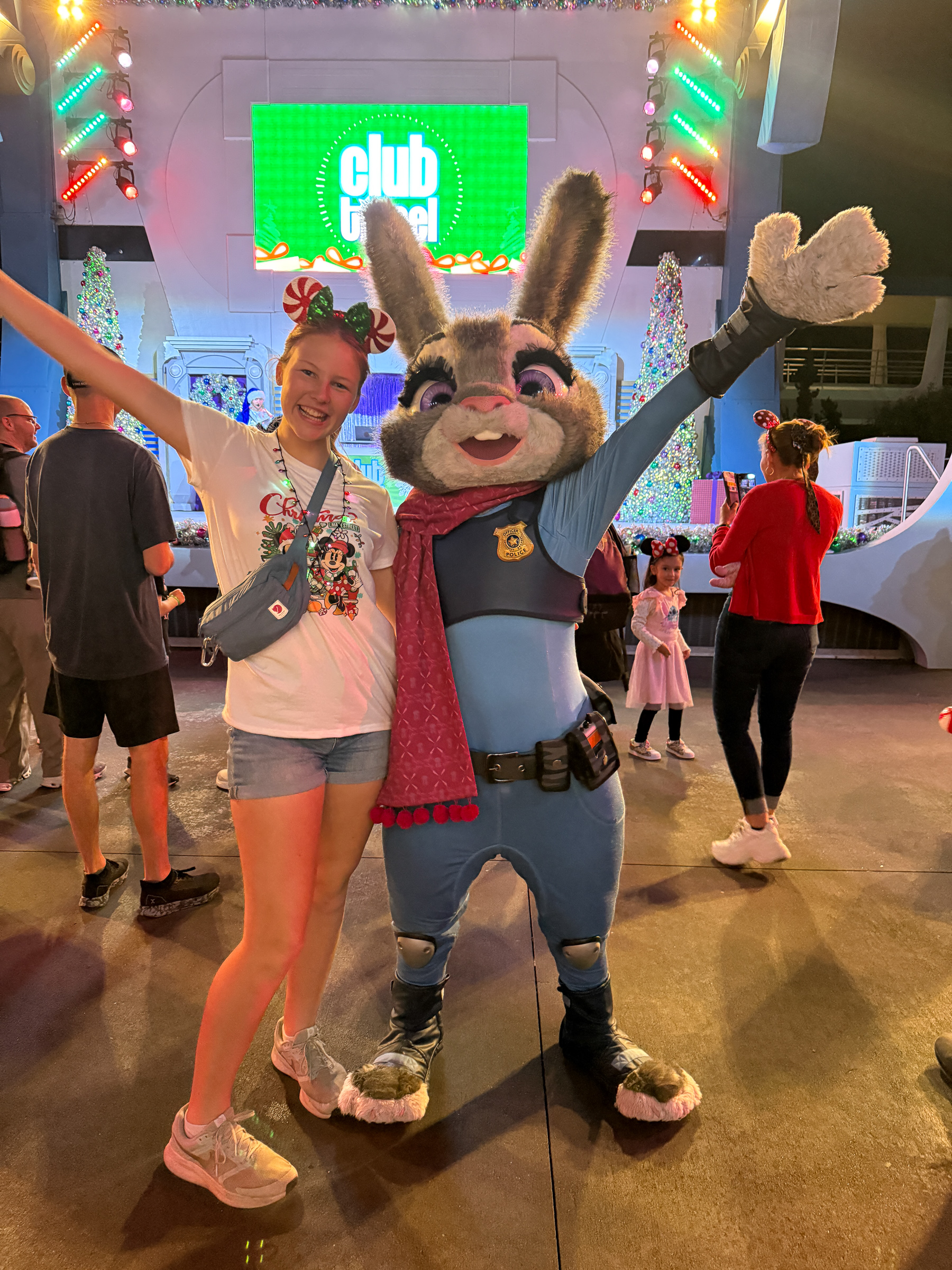 Teen girl posing with Judy Hopps during Mickey’s Very Merry Christmas Party at Magic Kingdom.